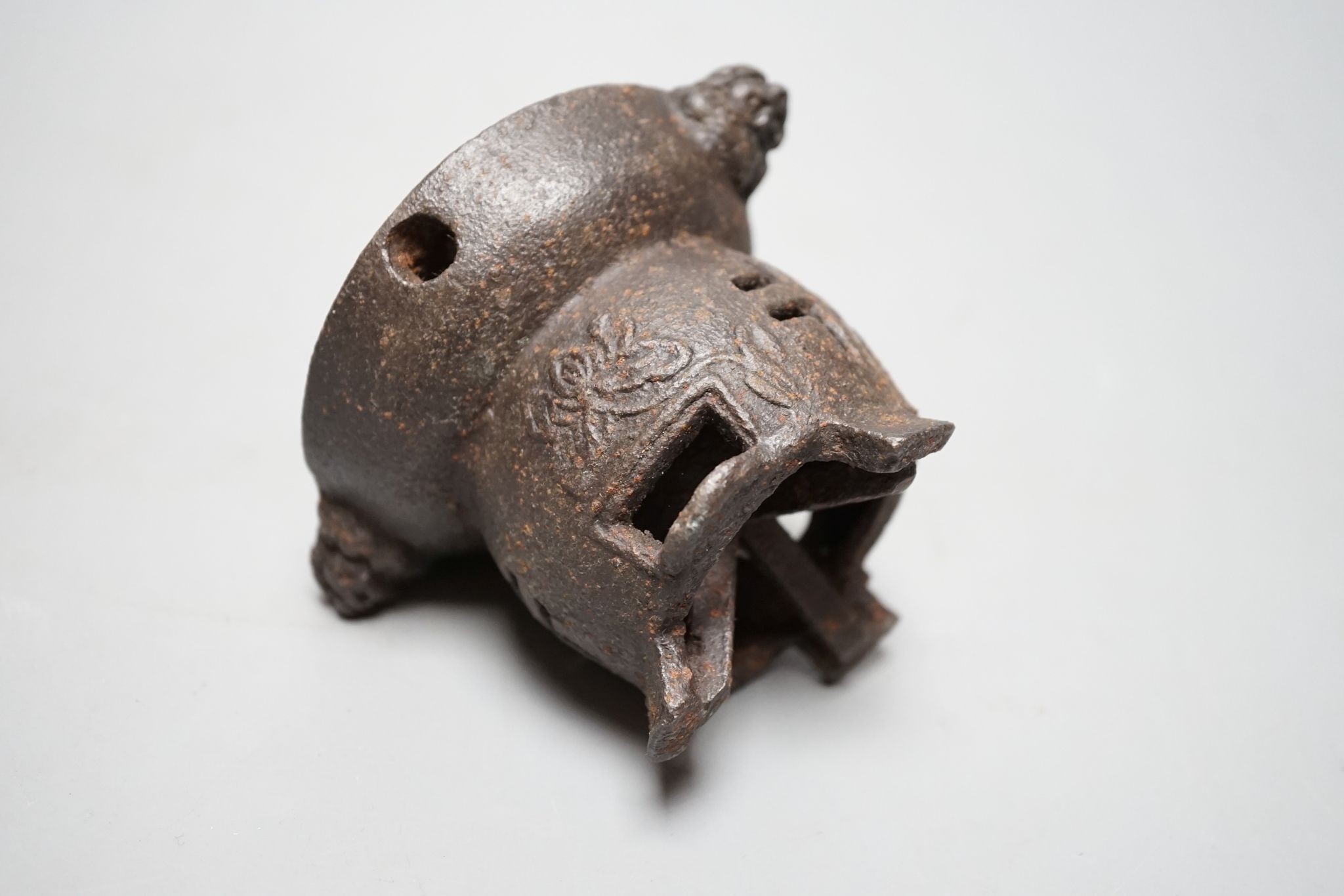 A Japanese cast iron burner stand, 6.5 cms high.